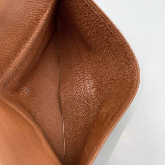 Auth Louis Vuitton Monogram
Portefeuille International MI0921 - Picture 7 of 12